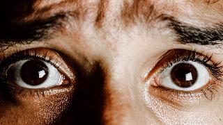 extreme-close-up-photo-of-frightened-eyes