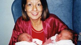 COPY COLLECT. ANGELA MILLTHORPE WITH NEWBORN TWINS JADE AND JAKE. WHEN IAN MILLTHORPE'S WIFE ANGELA WAS DYING OF CANCER SHE KNEW THAT SHE HAD TO PREPARE HIM TO LOOK AFTER THEIR EIGHT CHILDREN WHEN SHE HAD GONE. SO SHE PUT HIM THROUGH AN INTENSIVE SIX MONTHS 'MUMMY TRAIING' TO SHOW HIM EVERYTHING THAT HE NEEDED TO DO FOR THEIR FAMIL