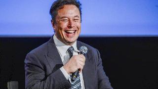 Tesla CEO Elon Musk smiles as he addresses guests at the Offshore Northern Seas 2022 (ONS) meeting in Stavanger, Norway on August 29, 2022.