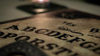 A Ouija board close up.