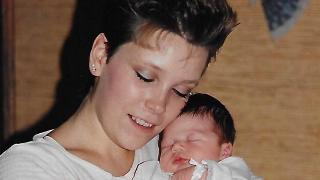 Rachel's mom holding her when she was newly born, before putting her up for adoption.