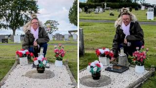 Ross kneeling at the now-properly labeled grave of her father, with candles and flowers placed on it.