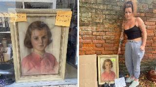 The painting in the store's window. | Zoe standing next to the painting.