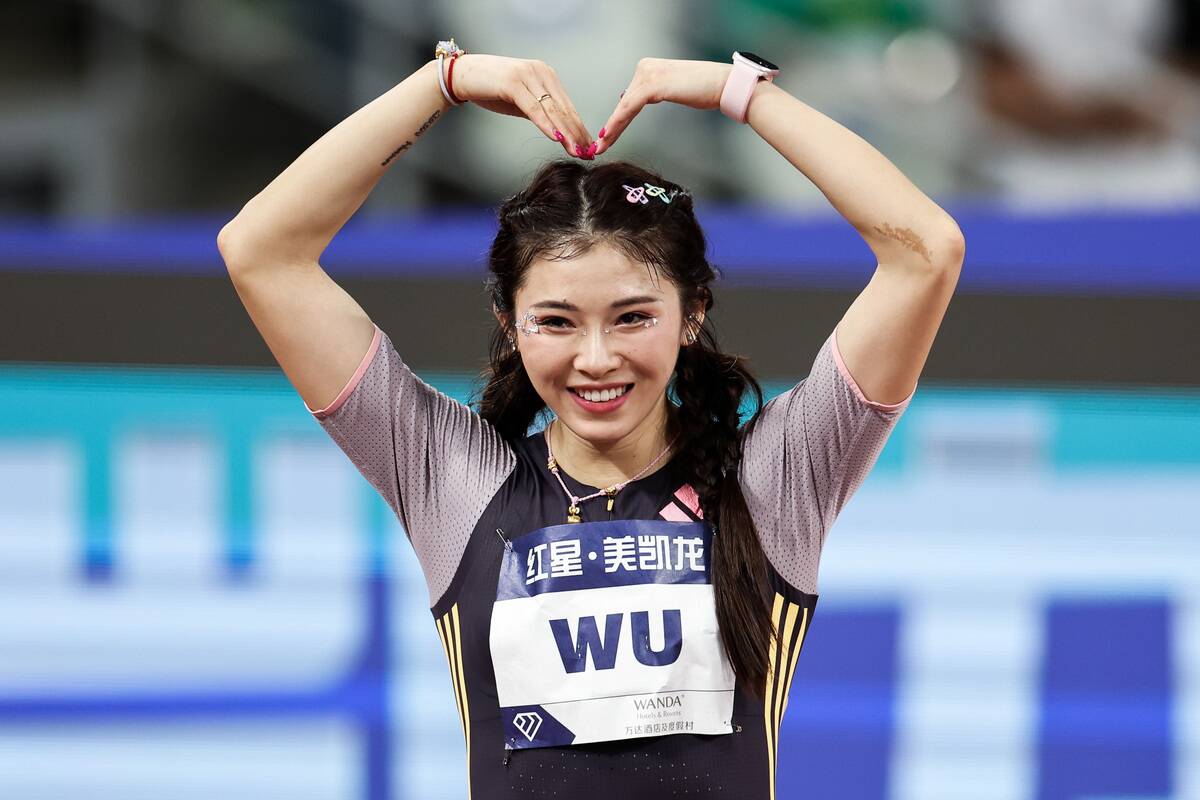 XIAMEN, CHINA - APRIL 20: Wu Yanni of China reacts during the Women's 100M hurdles during the 2024 Diamond League Xiamen Meeting at Xiamen Egret Stadium on April 20, 2024 in Xiamen, China.