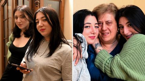 Georgian twin sisters Anna Panchulidze (L), an English student at university, and Elene Deisadze (R), a psychology student, and Elene's adoptive mother, Lia Korkotadze, pose during an interview with AFP in Tbilisi on March 23, 2024.