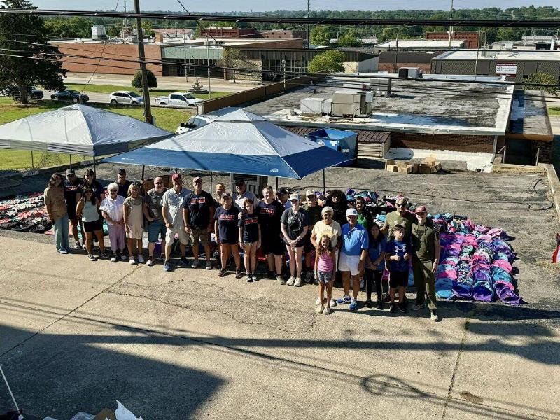 All the volunteers in a group photo before the backpack drive began.