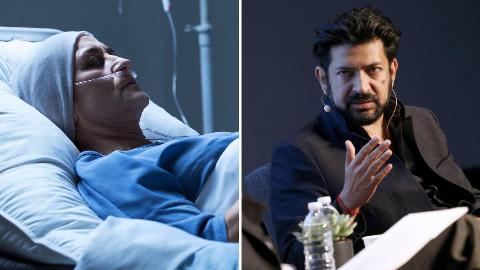 A woman laying still in a hospital bed, clearly in critical condition,  as a woman sits next to the bed, holding the patient's hand in both of 
her own, leaning her face against it. | Oncologist and assistant professor of medicine at Columbia University   Siddhartha Mukherjee speaks onstage during the 2017 New Yorker TechFest 
at Cedar Lake on October 6, 2017 in New York City.