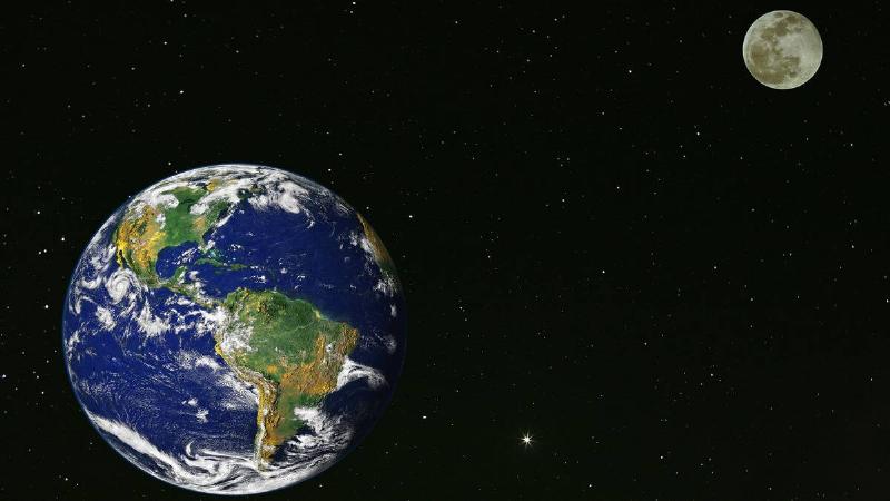 A render of Earth and the Moon in space and their relative distance.