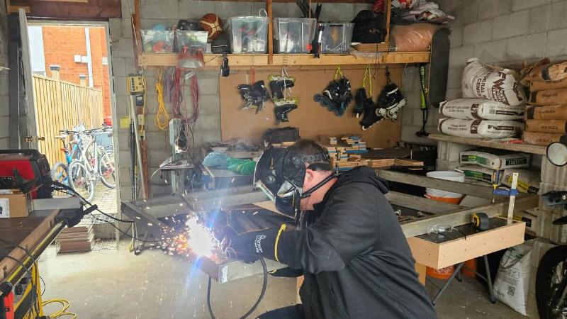 Ryan working away at building a prototype for the bike frame.