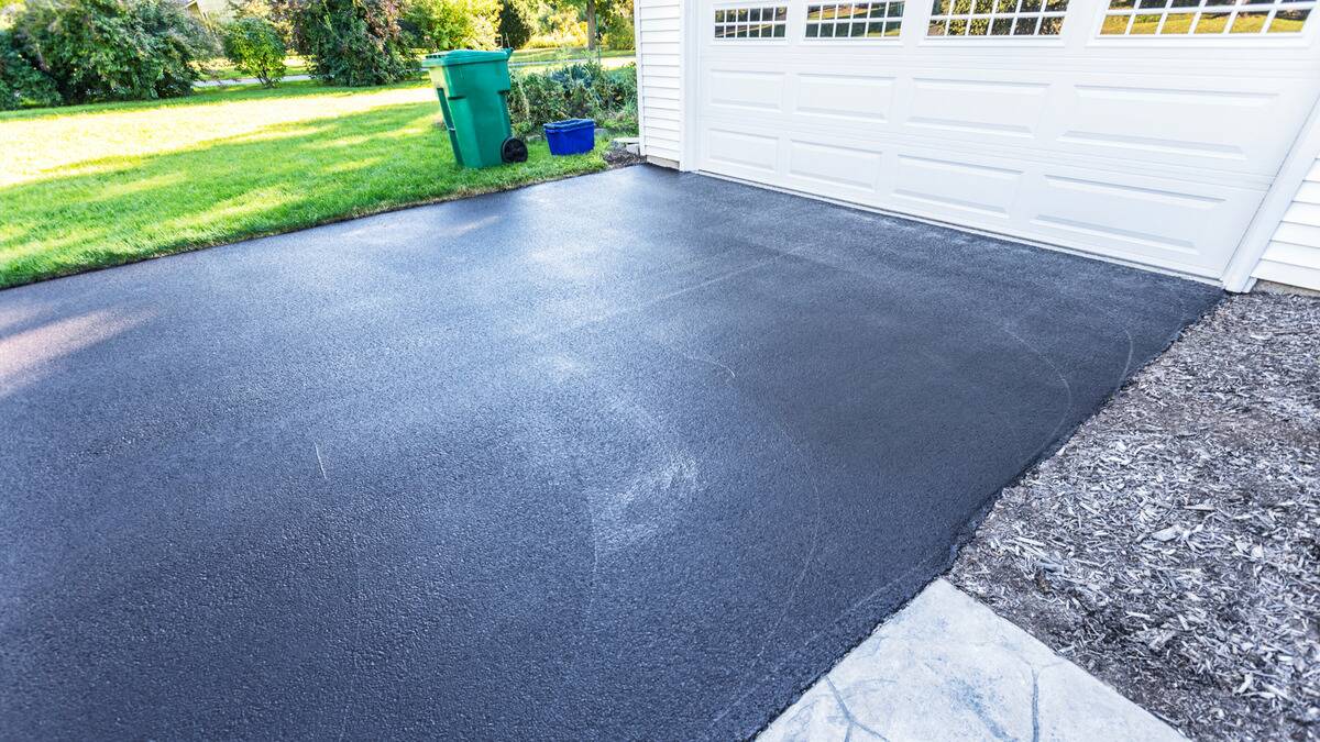 A freshly paved driveway.