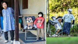 This photo taken on October 21, 2024 shows Hisayo Yamazaki standing next to the puppets outside her house in the village of Ichinono in the city of Tamba-Sasayama, Hyogo Prefecture. | This photo taken on October 21, 2024 shows puppets in the village of Ichinono, one of the 