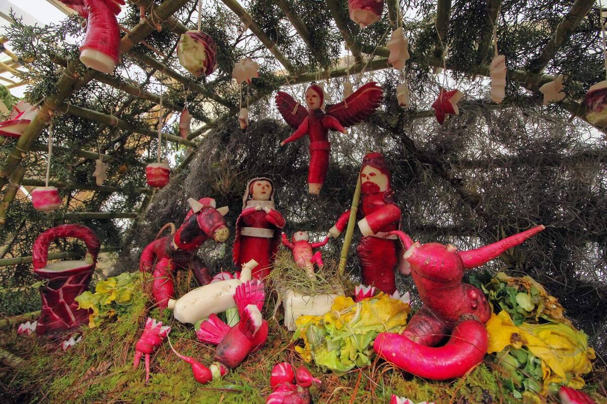 Carved radishes are displayed during the celebration of the 