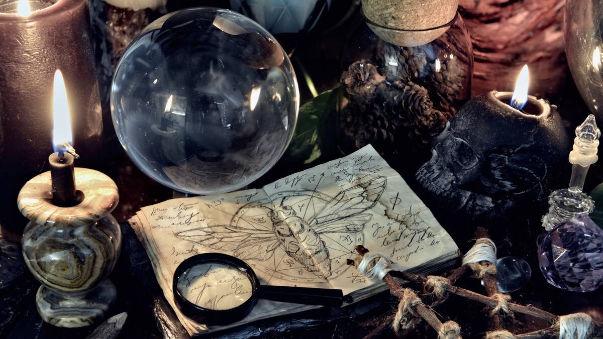 A table covered in mystical, magical instruments and tools.