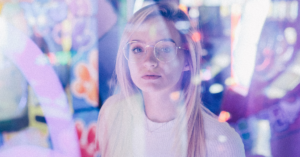 woman wearing glasses in lighting