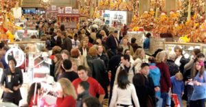 Shoppers clog the aisles at Macy's Department store November 28, 2003 in New York City. Black Friday , the day after Thanksgiving and traditionally the kickoff to the Christmas shopping season is expected to be big, thanks to a rebounding U.S. economy that is positioned to drive better sales, particularly of higher-end goods. 