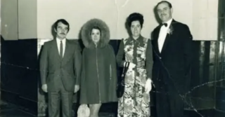 vintage photo of family dressed to go out